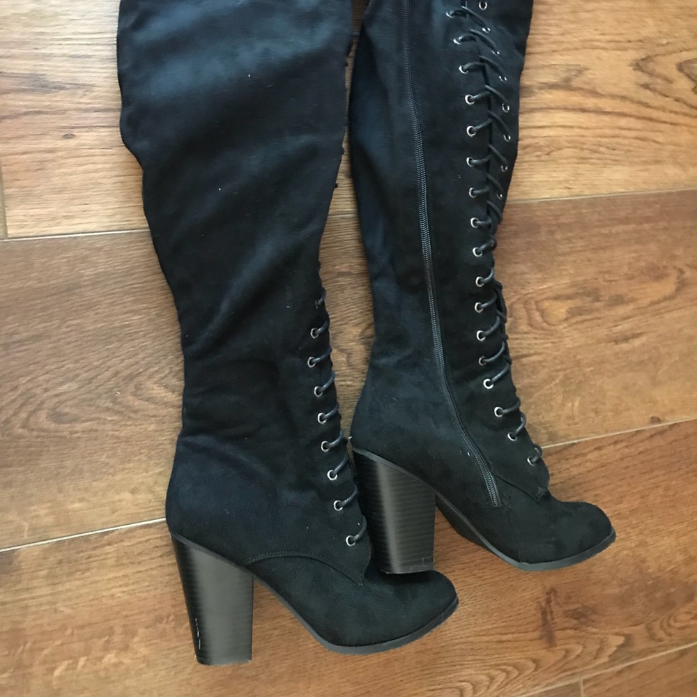 Over the knee black boots